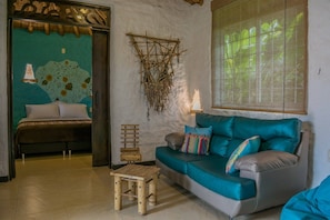 Suite Junior | Salle de séjour | Télévision à écran plat