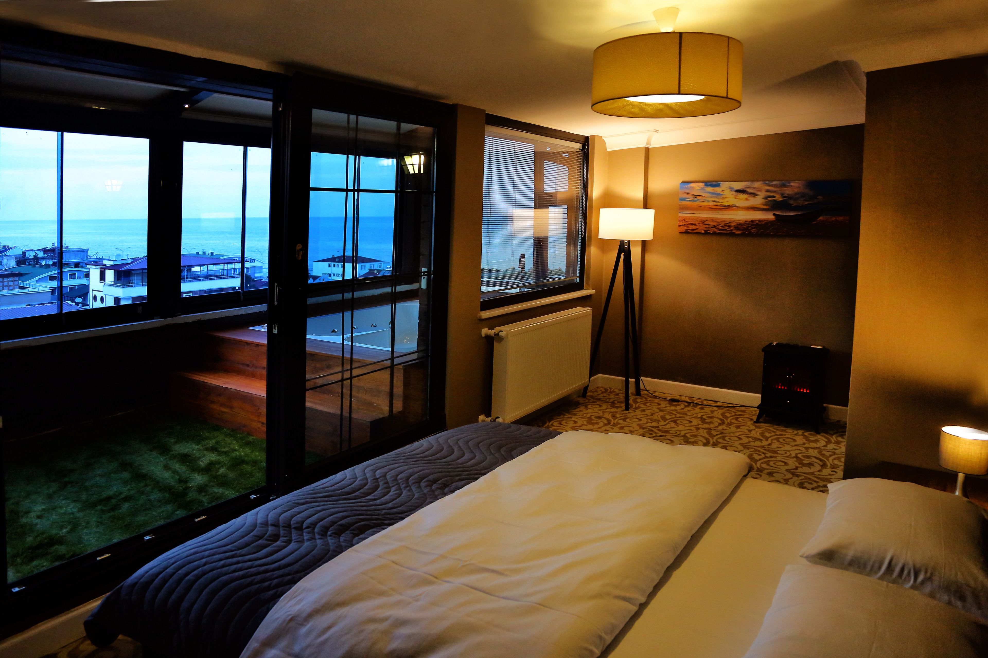 sky suite - spa bathtub | premium bedding, free minibar items, desk, soundproofing