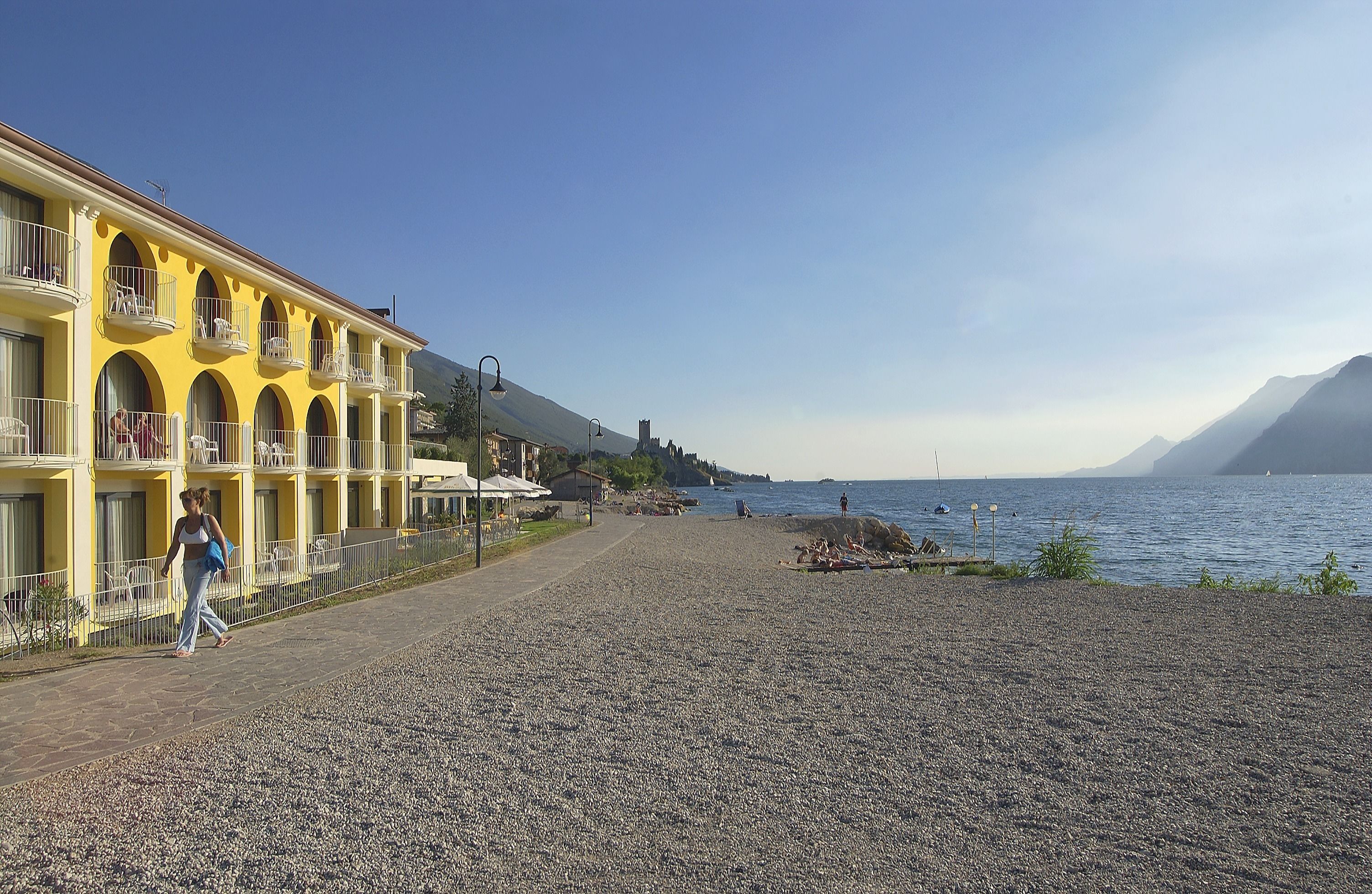 Sun-loungers, beach umbrellas, beach bar, rowing