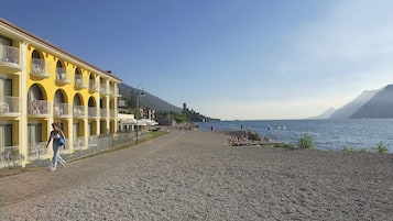 Sun-loungers, beach umbrellas, beach bar, rowing