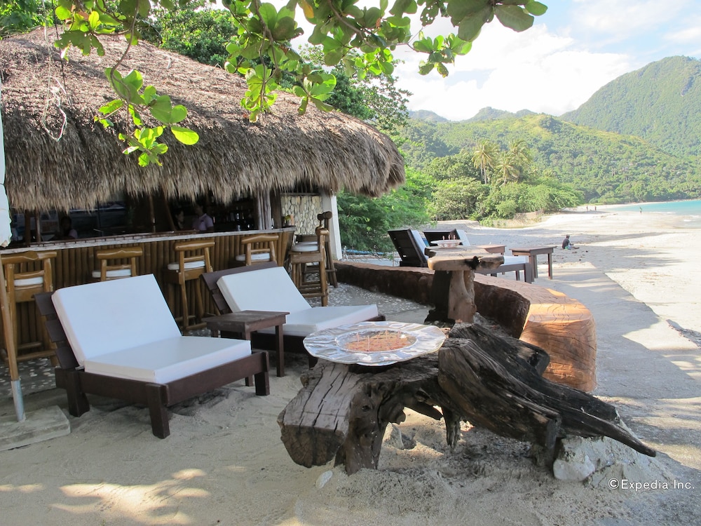 Sunset at Aninuan Beach Resort by null