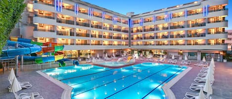 2 outdoor pools, open 7:00 AM to 7:00 PM, pool umbrellas, pool loungers