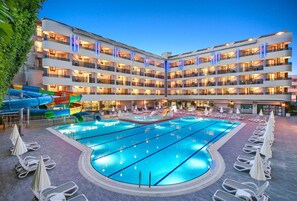 2 outdoor pools, open 7:00 AM to 7:00 PM, pool umbrellas, pool loungers