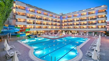 2 outdoor pools, open 7:00 AM to 7:00 PM, pool umbrellas, pool loungers