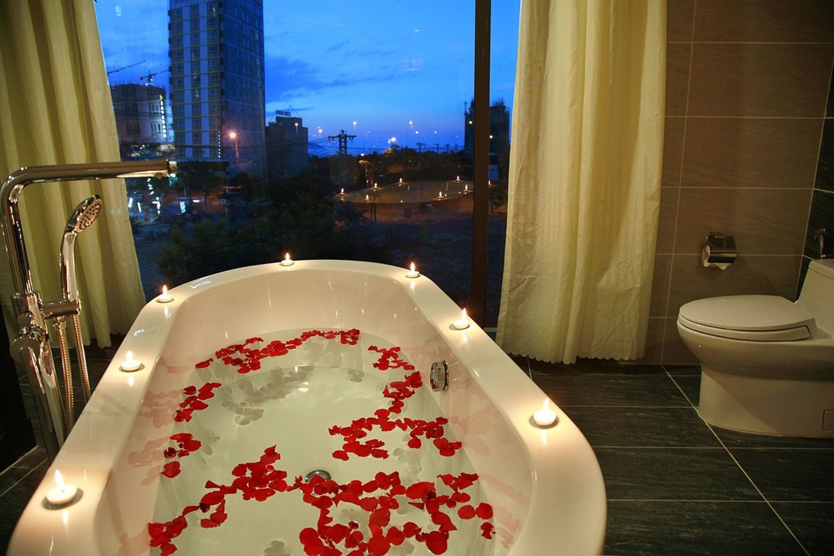 VIP | Bathroom | Hydromassage showerhead, designer toiletries, hair dryer, bathrobes