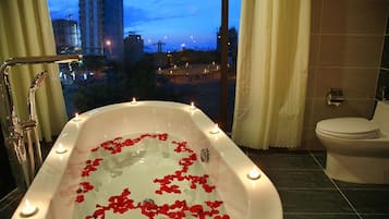 VIP | Bathroom | Hydromassage showerhead, designer toiletries, hair dryer, bathrobes