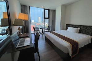 Chambre Quadruple Deluxe, vue partielle sur l'océan