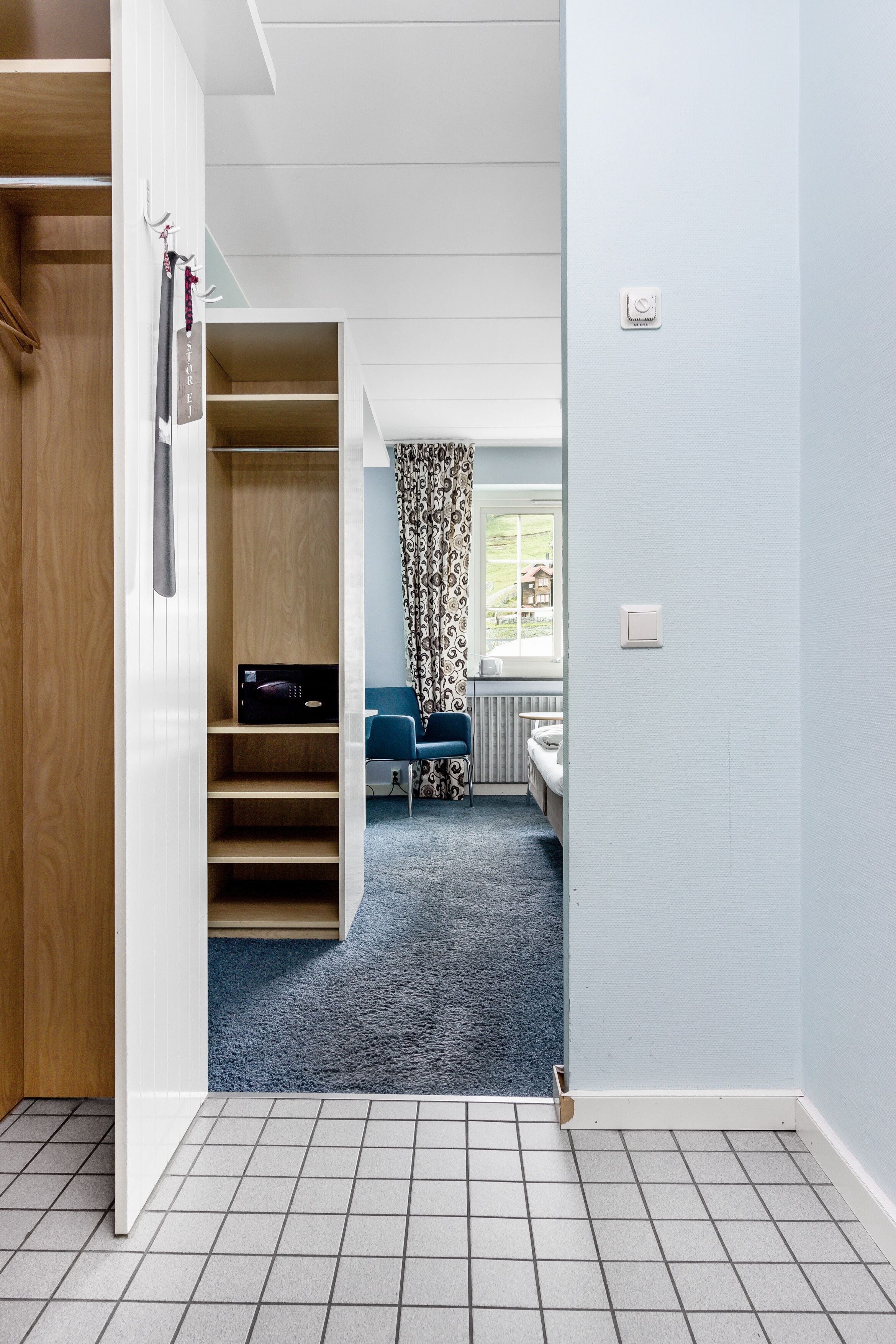 desk, laptop workspace, blackout curtains, bed sheets