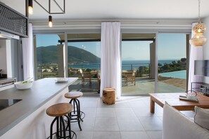 Luxury Villa, 2 Bedrooms, Private Pool, Sea View | Living area | Flat-screen TV, ping pong - Anemos Luxury Villas (Lefkada)