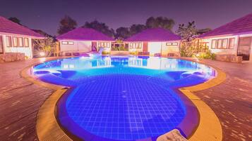 Poolside Canal View Villa | Outdoor pool | Outdoor pool, pool umbrellas, sun loungers