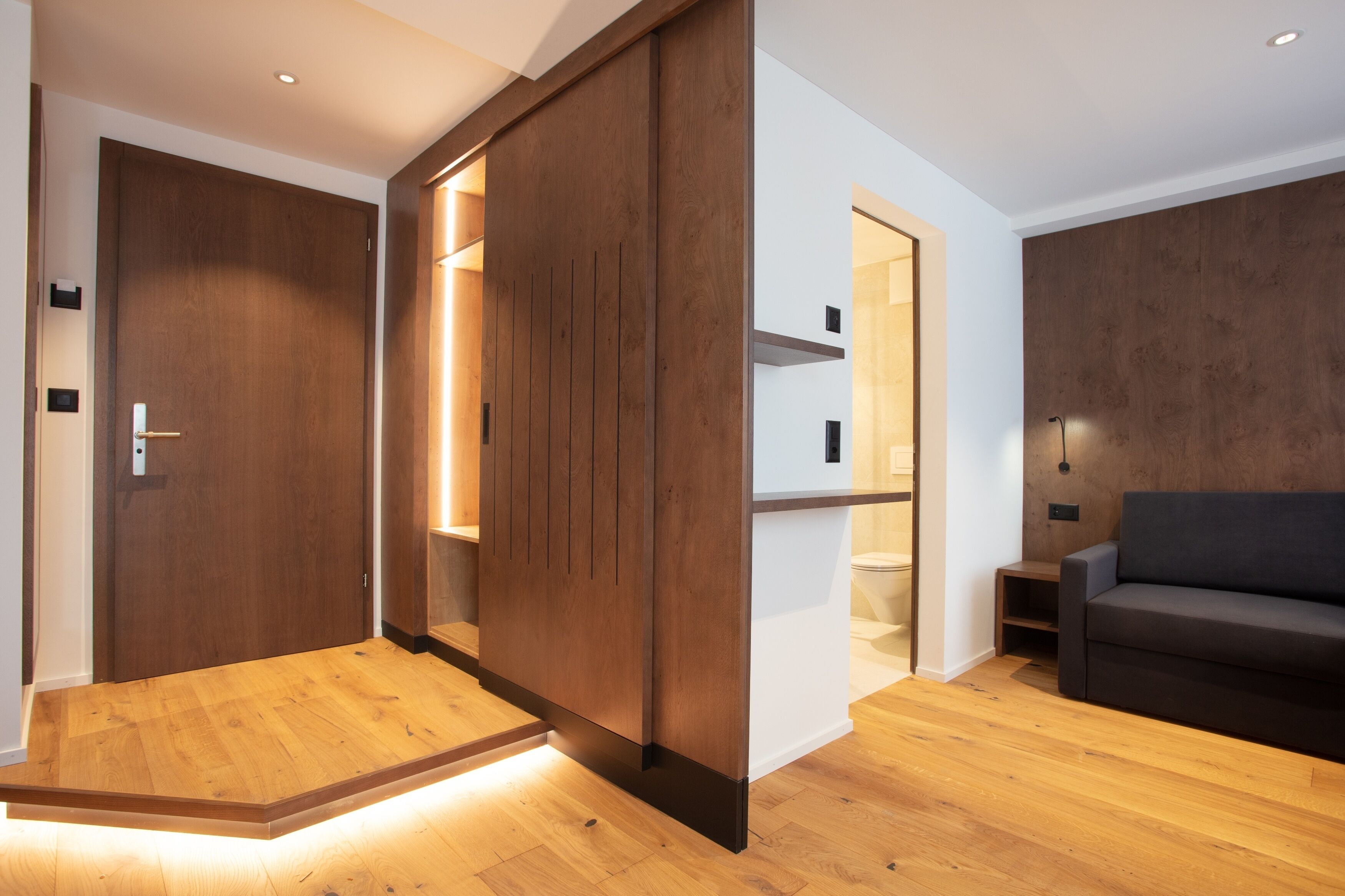 deluxe room, balcony | living area | flat-screen tv