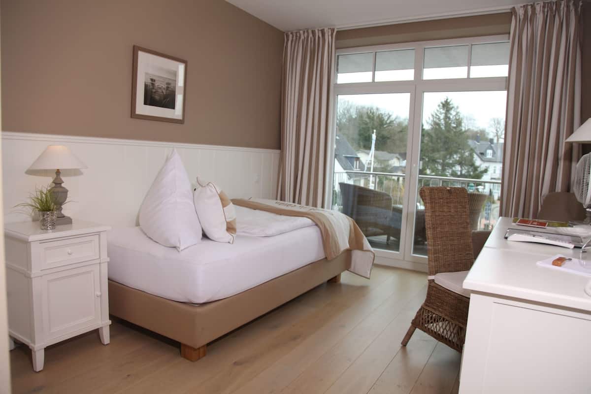 Ropa de cama de alta calidad y minibar