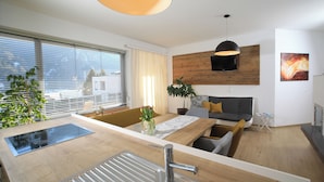 Apartment, 2 Bedrooms, Valley View | Living area | Flat-screen TV, heated floors