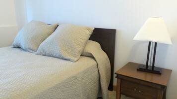 Apartment, 2 Queen Beds, Kitchen, Partial Ocean View | 1 bedroom, free cribs/infant beds, free WiFi