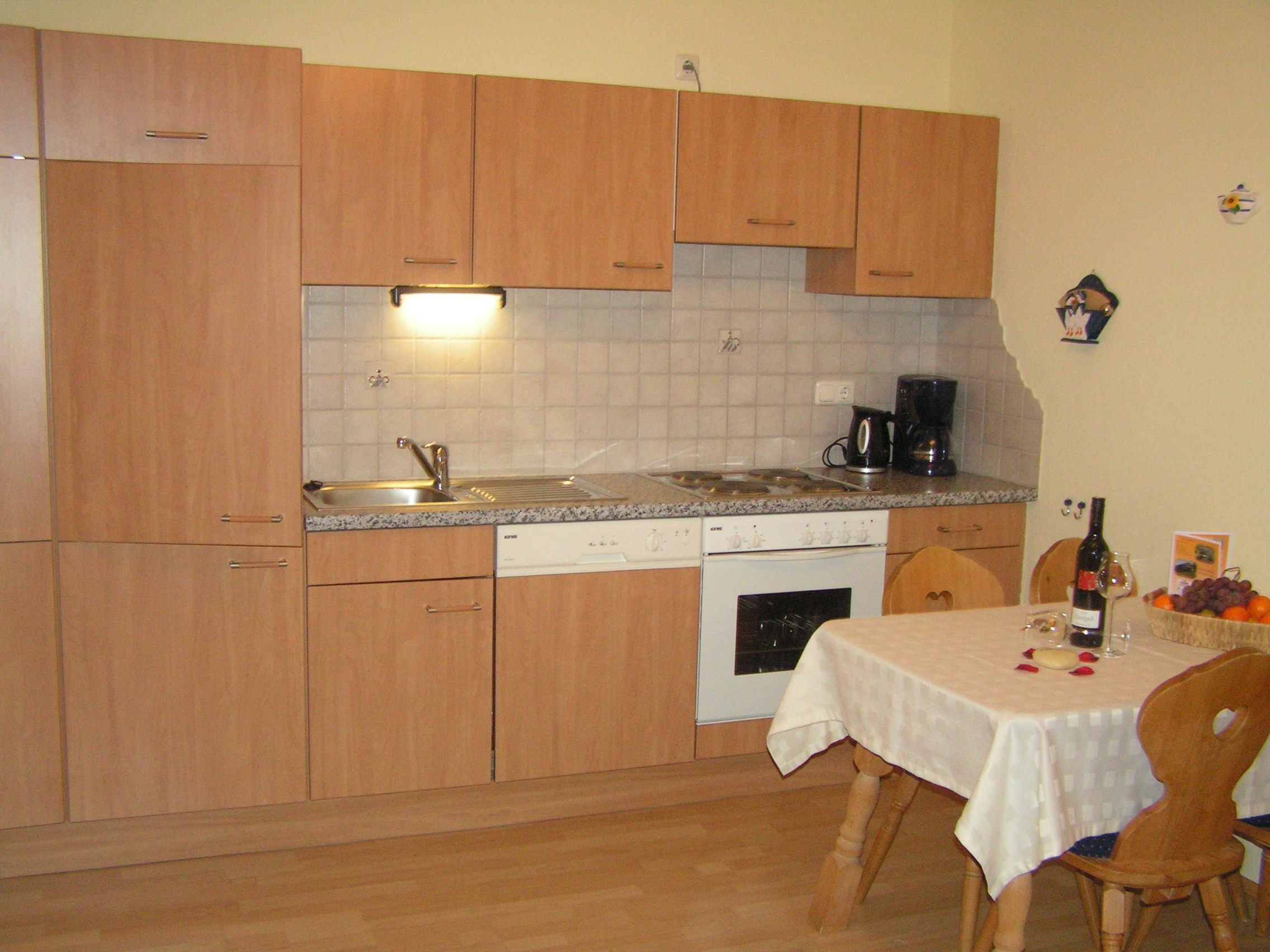 full-sized fridge, oven, stovetop, dishwasher