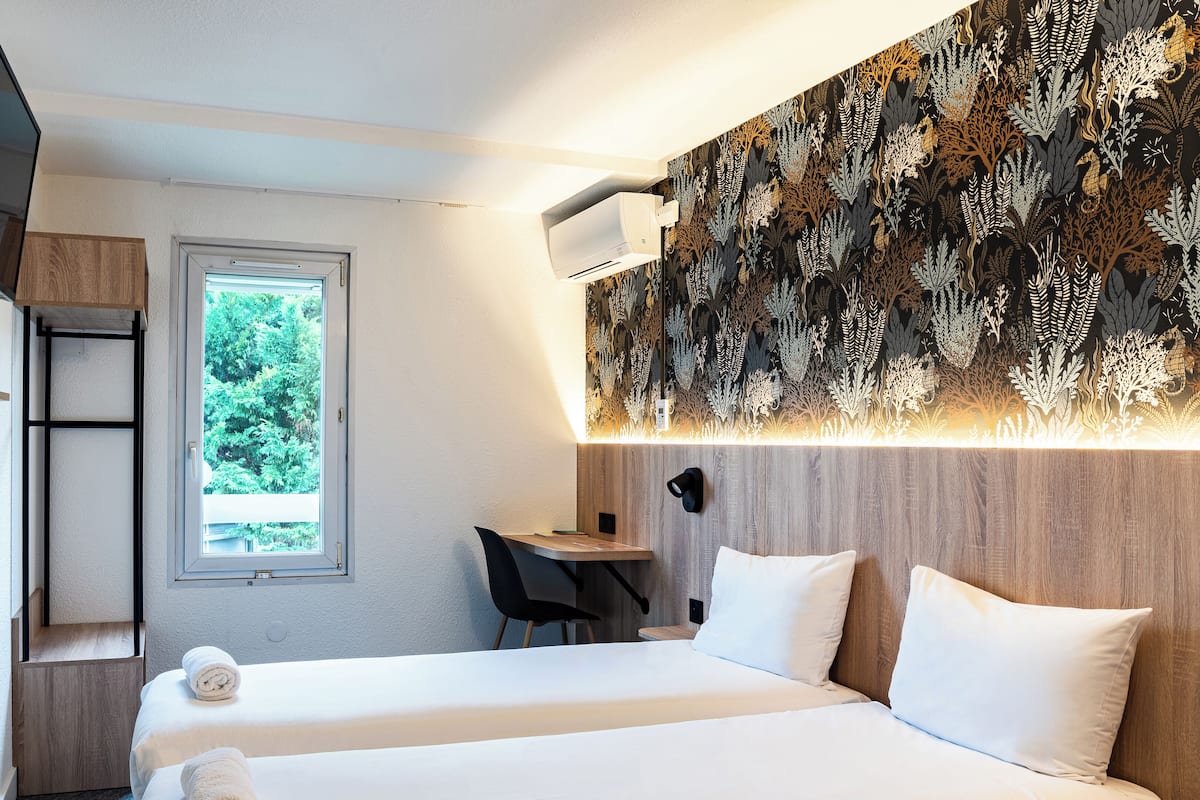 Premium bedding, desk, blackout curtains, soundproofing