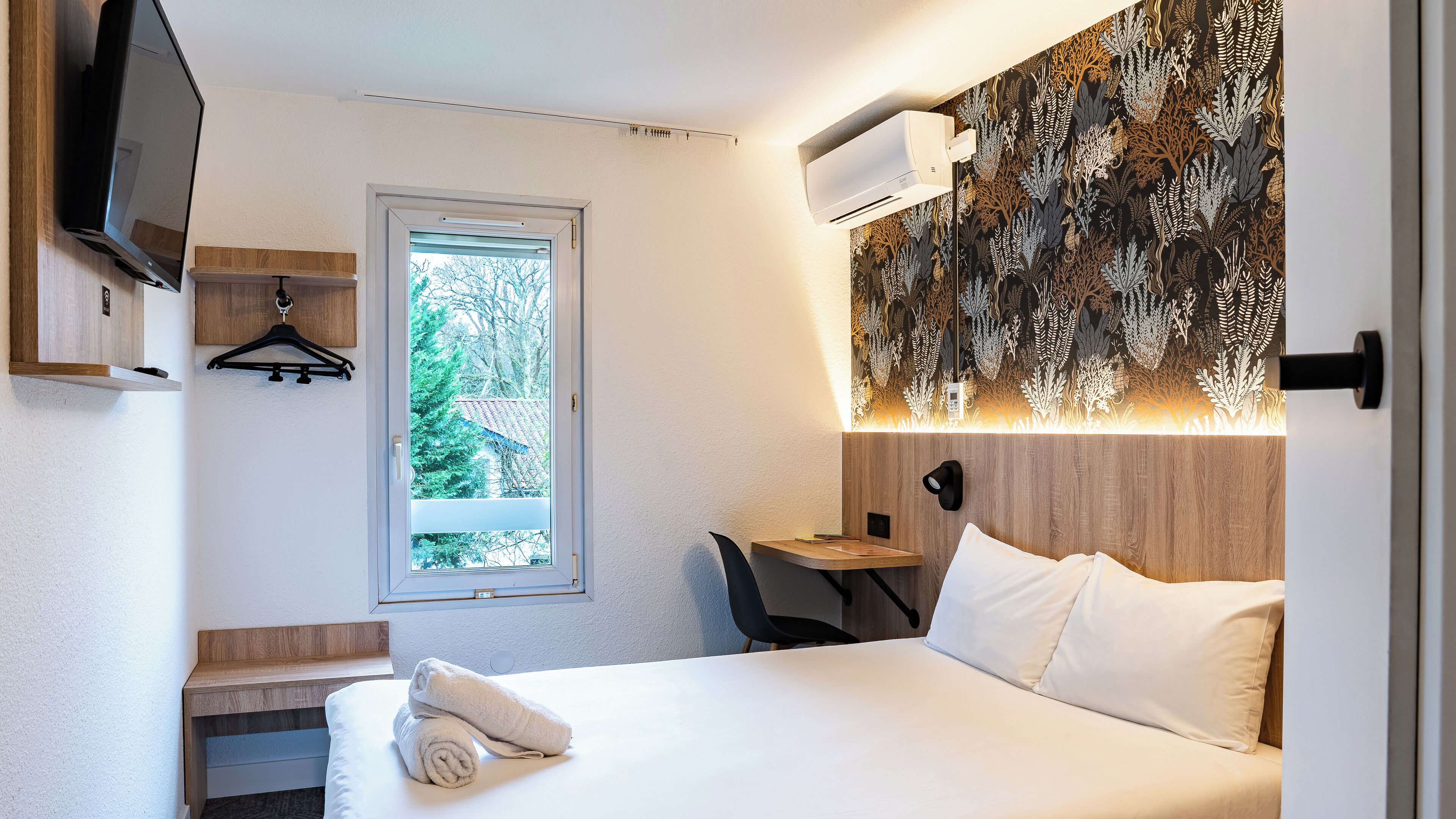 Premium bedding, desk, blackout curtains, soundproofing