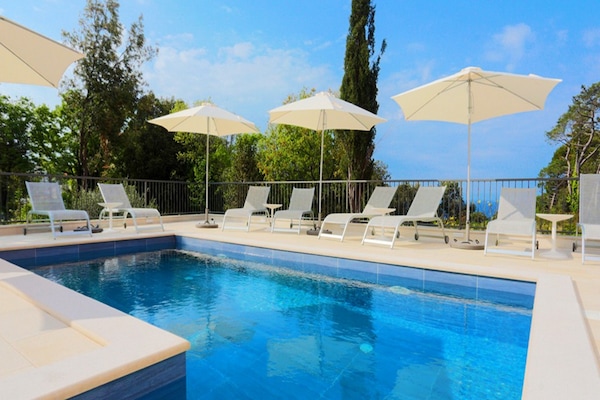 Outdoor pool, open 9:00 AM to 7:00 PM, pool umbrellas, sun loungers