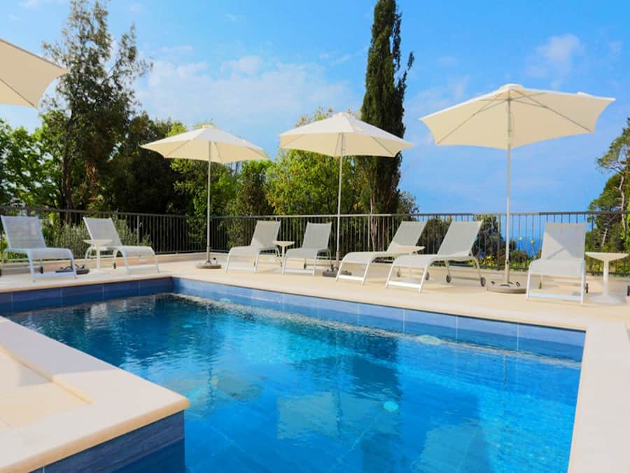 Outdoor pool, open 9:00 AM to 7:00 PM, pool umbrellas, sun loungers