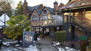 A traditional building with a sign reading "The Old Mill." - The Old Mill by Chef and Brewer Collection (Coventry)