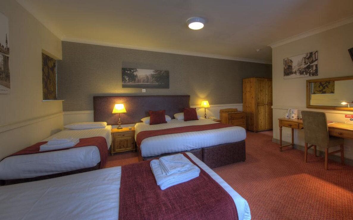 family double room, multiple beds | desk, iron/ironing board, free wifi, bed sheets