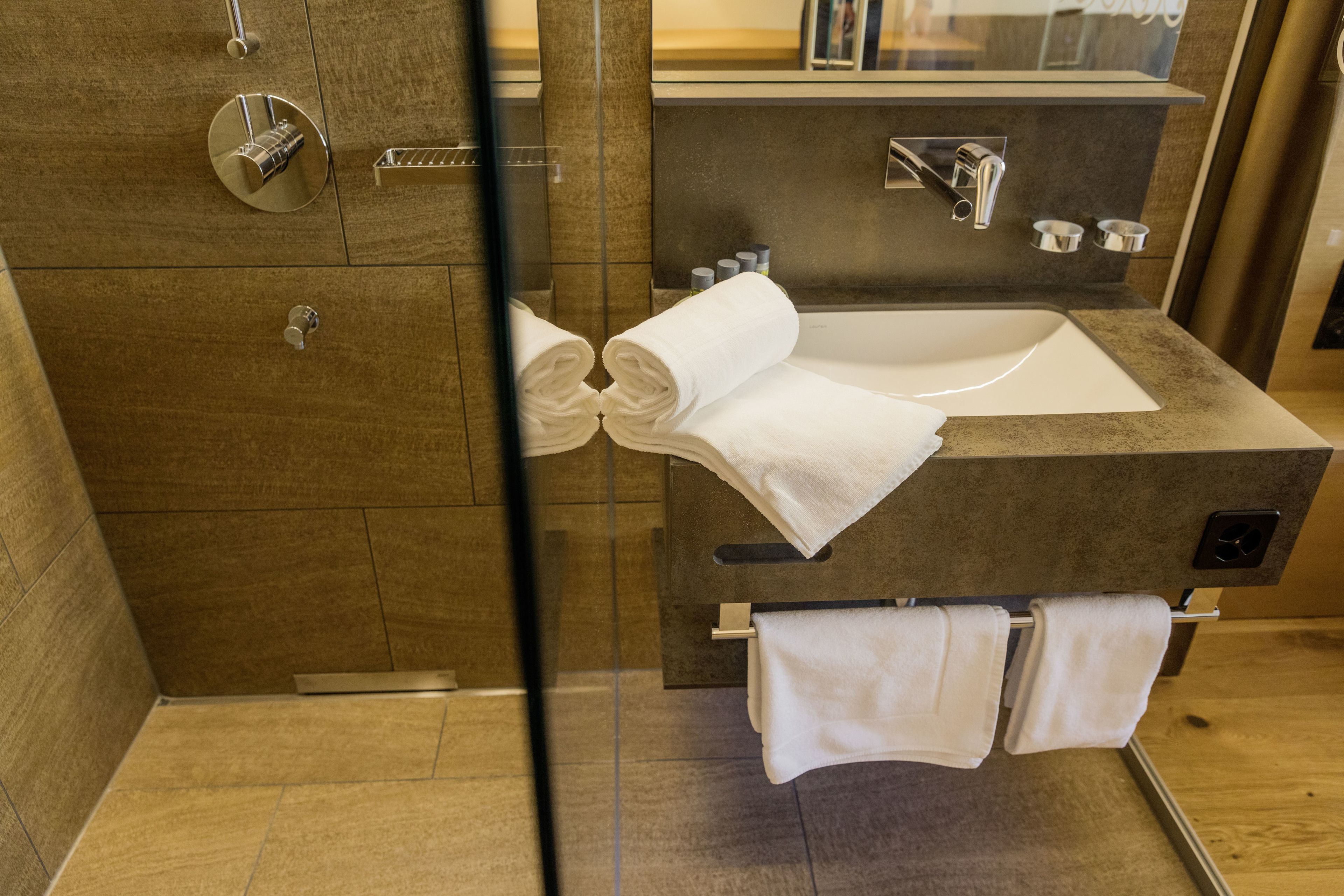 shower, hair dryer, bathrobes, slippers