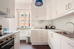 Apartment, 4 Bedrooms, City View | Private kitchen | Full-size fridge, microwave, oven, dishwasher - Flattered to be in Lisboa (Lisbon)