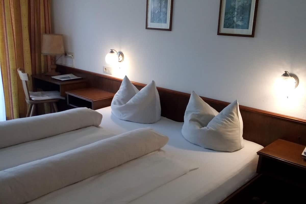 comfort room, lake view | in-room safe, bed sheets