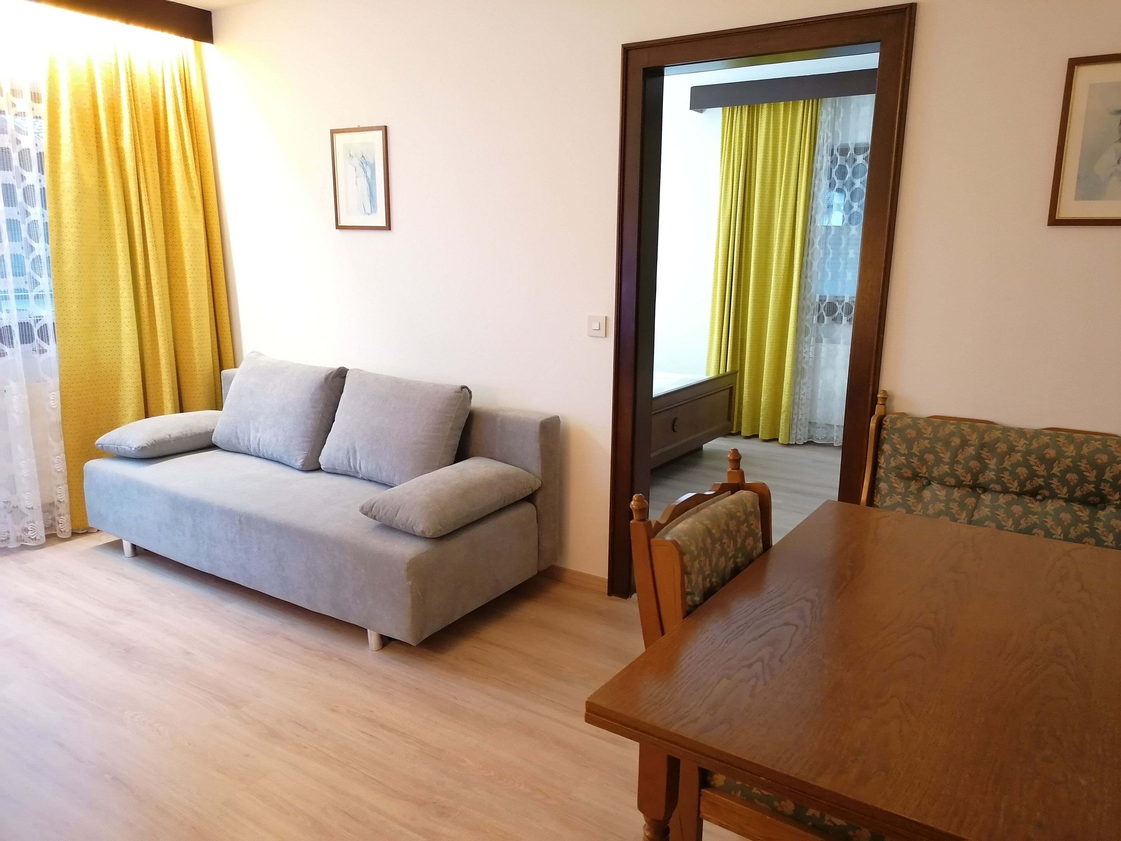 family room, 2 bedrooms, garden view, garden area | in-room safe, bed sheets