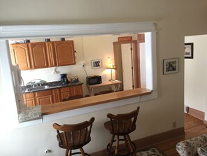Traditional Apartment, 1 King Bed with Sofa bed (Second Floor Walk Up) | Living area | 42-inch Smart TV with cable channels, TV - Historic Downtown Capitol Hotel Vacation Suites (Buffalo)