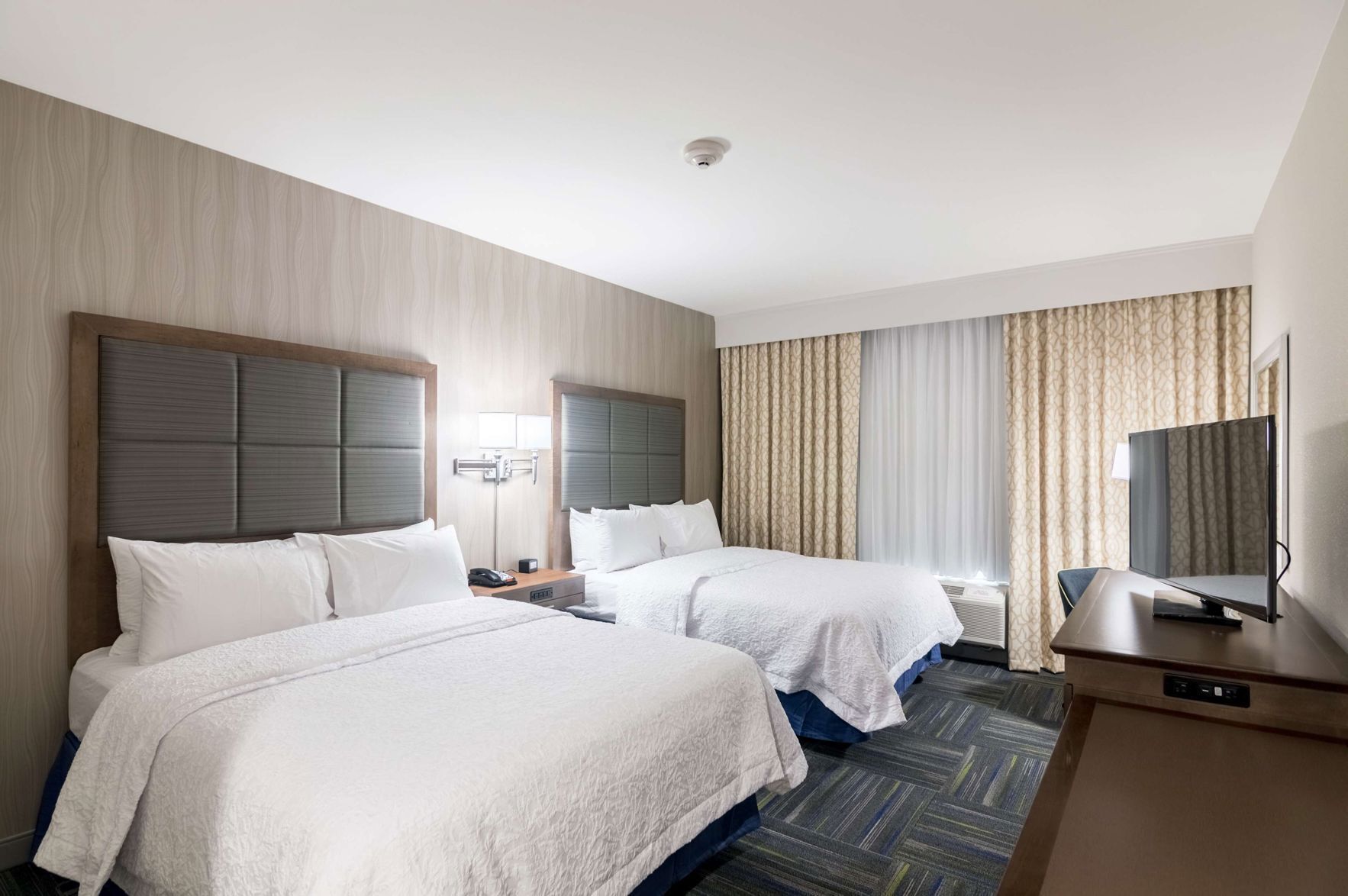 Premium bedding, down duvets, in-room safe, desk