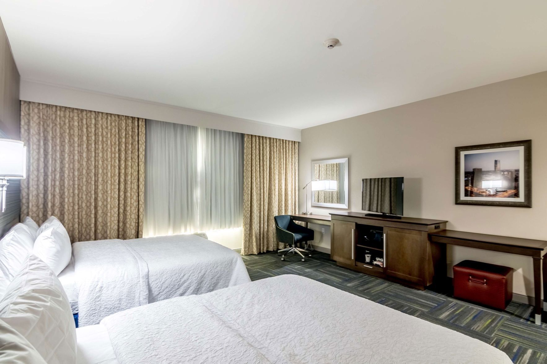 Premium bedding, down duvets, in-room safe, desk