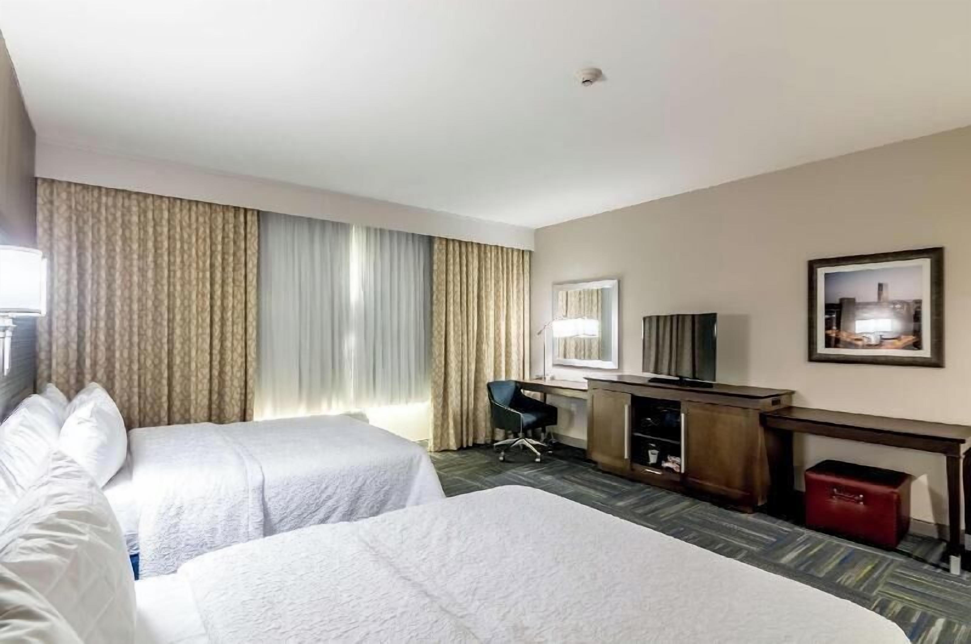 Premium bedding, down duvets, in-room safe, desk