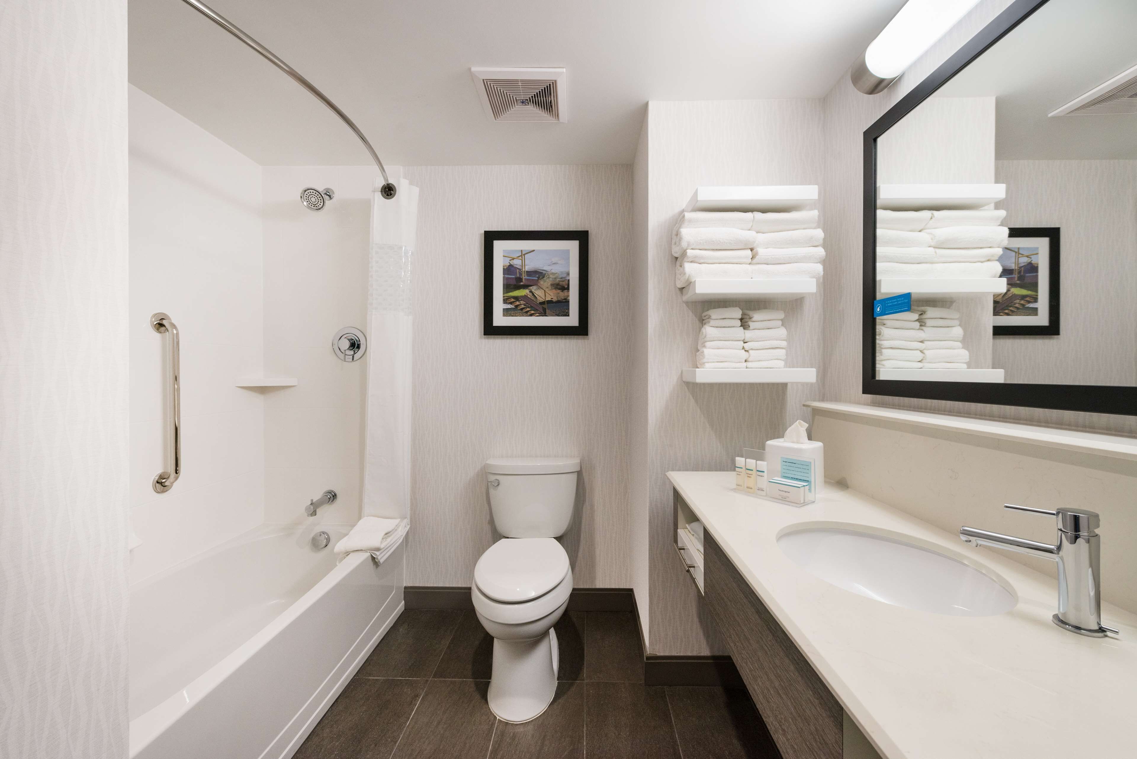 combined shower/bathtub, free toiletries, hair dryer, towels