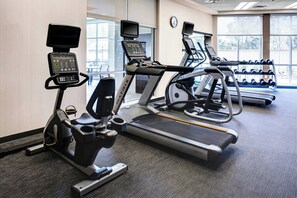 A gym with treadmills, a stationary bike, and a rowing machine. - Courtyard by Marriott Nashville Mount Juliet (Mount Juliet)