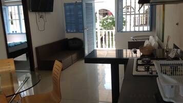 Apartment, 2 Bedrooms | Living area | 32-inch LCD TV with cable channels, TV