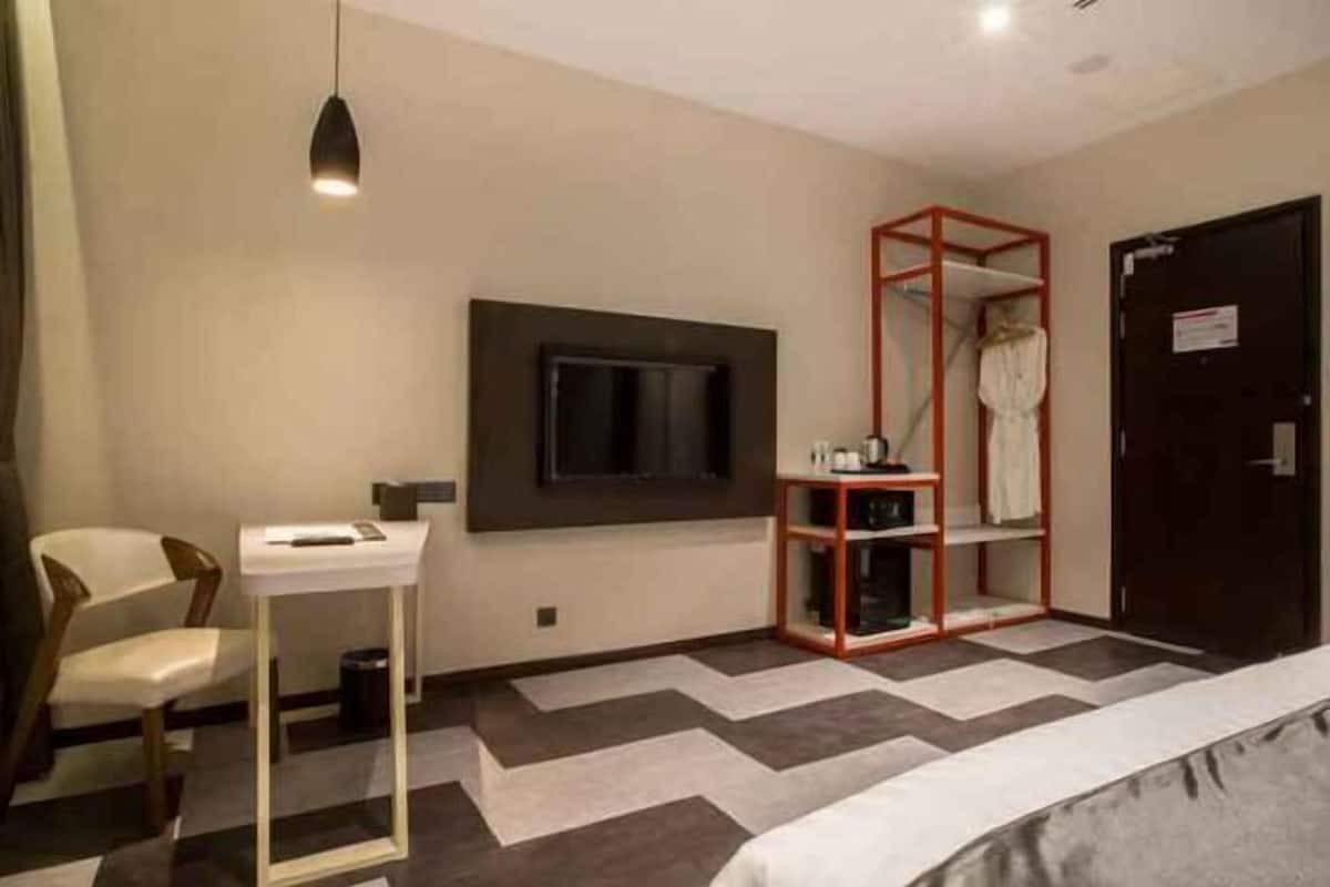 Free minibar, in-room safe, desk, iron/ironing board