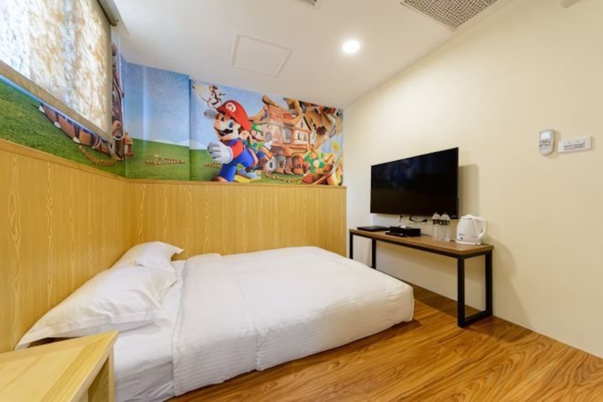 Premium bedding, desk, laptop workspace, blackout drapes