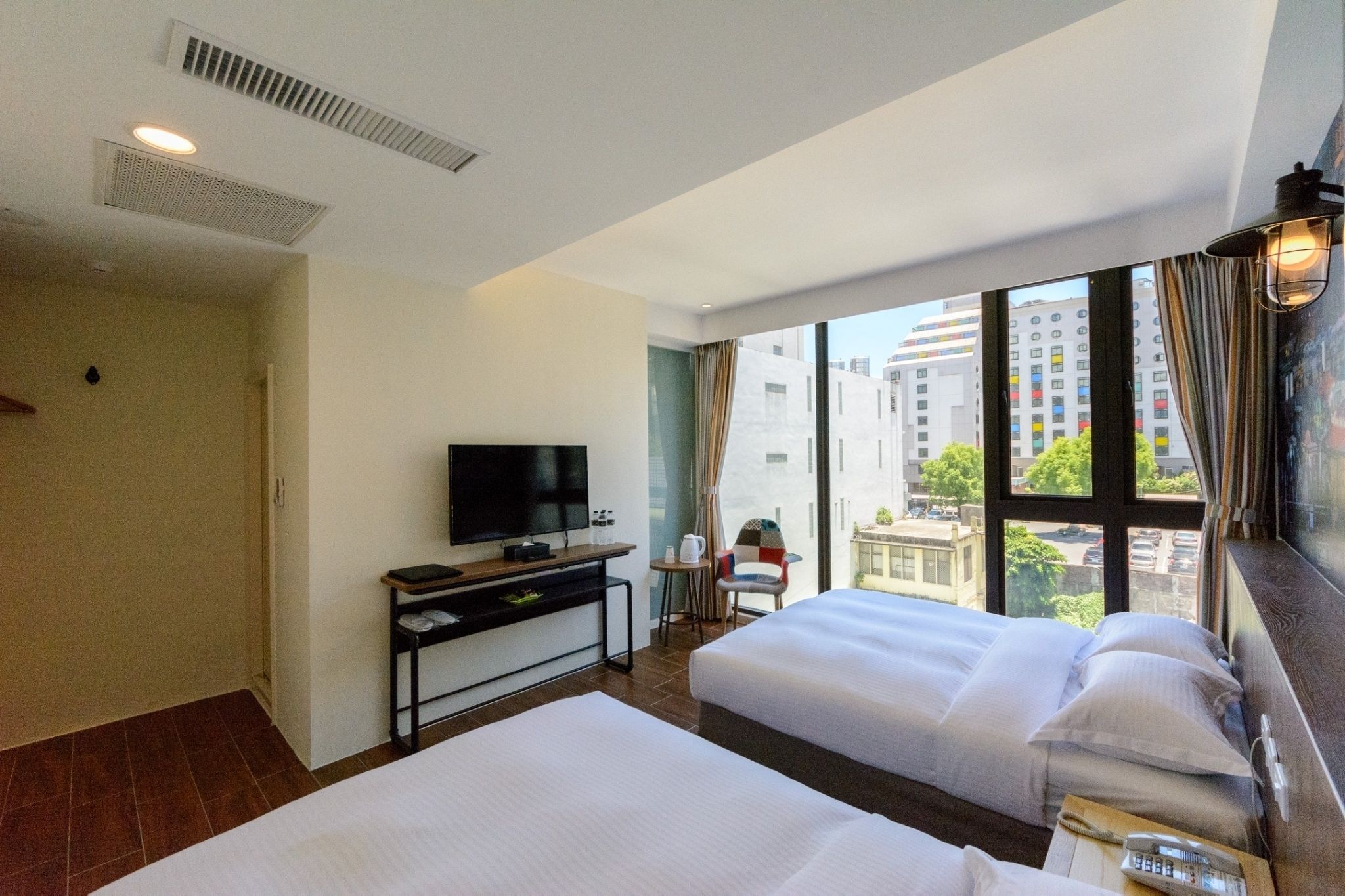 classic quadruple room | premium bedding, desk, laptop workspace, blackout curtains