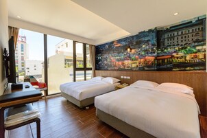 Premium bedding, desk, laptop workspace, blackout curtains