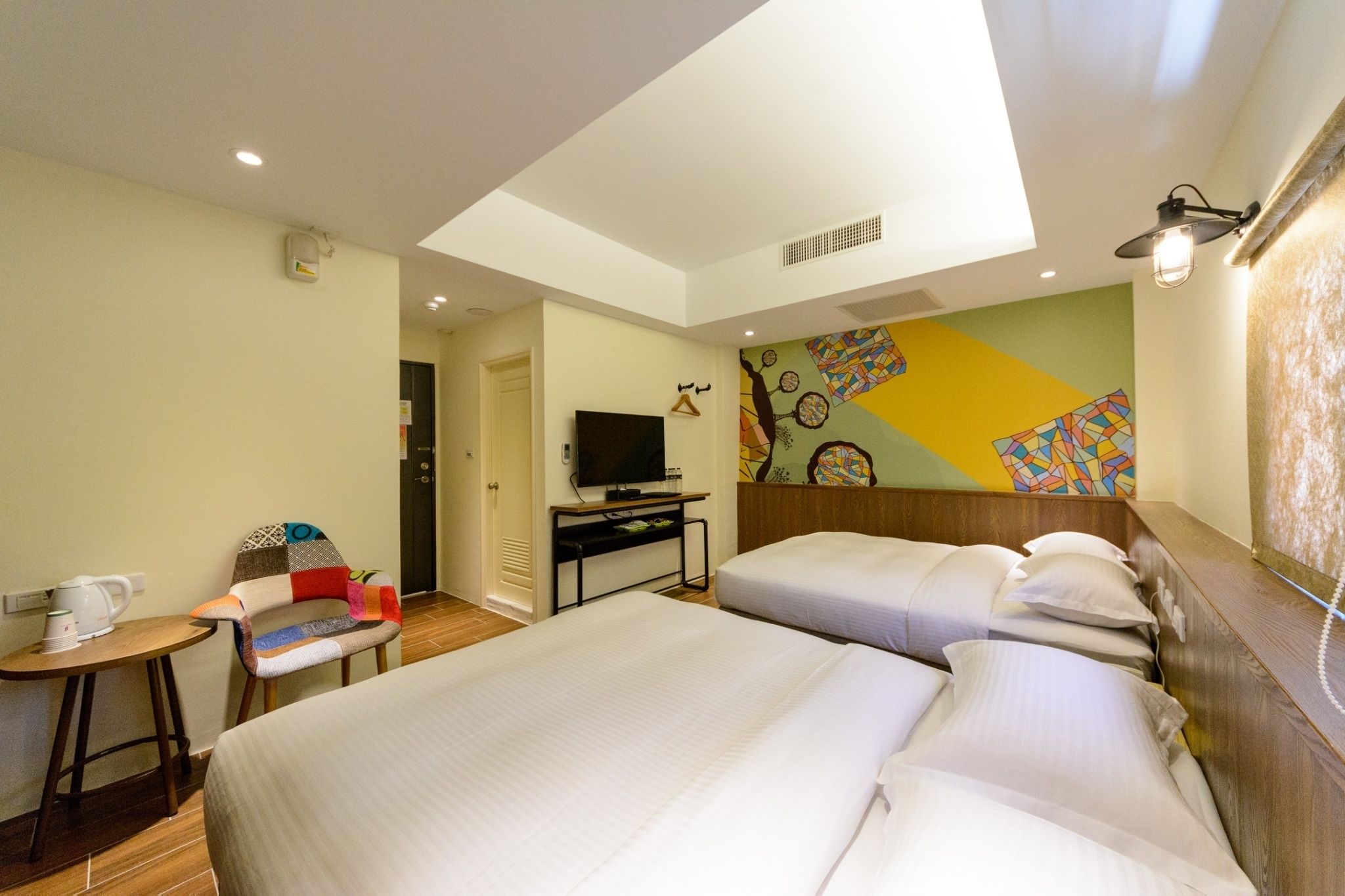 classic quadruple room | premium bedding, desk, laptop workspace, blackout curtains