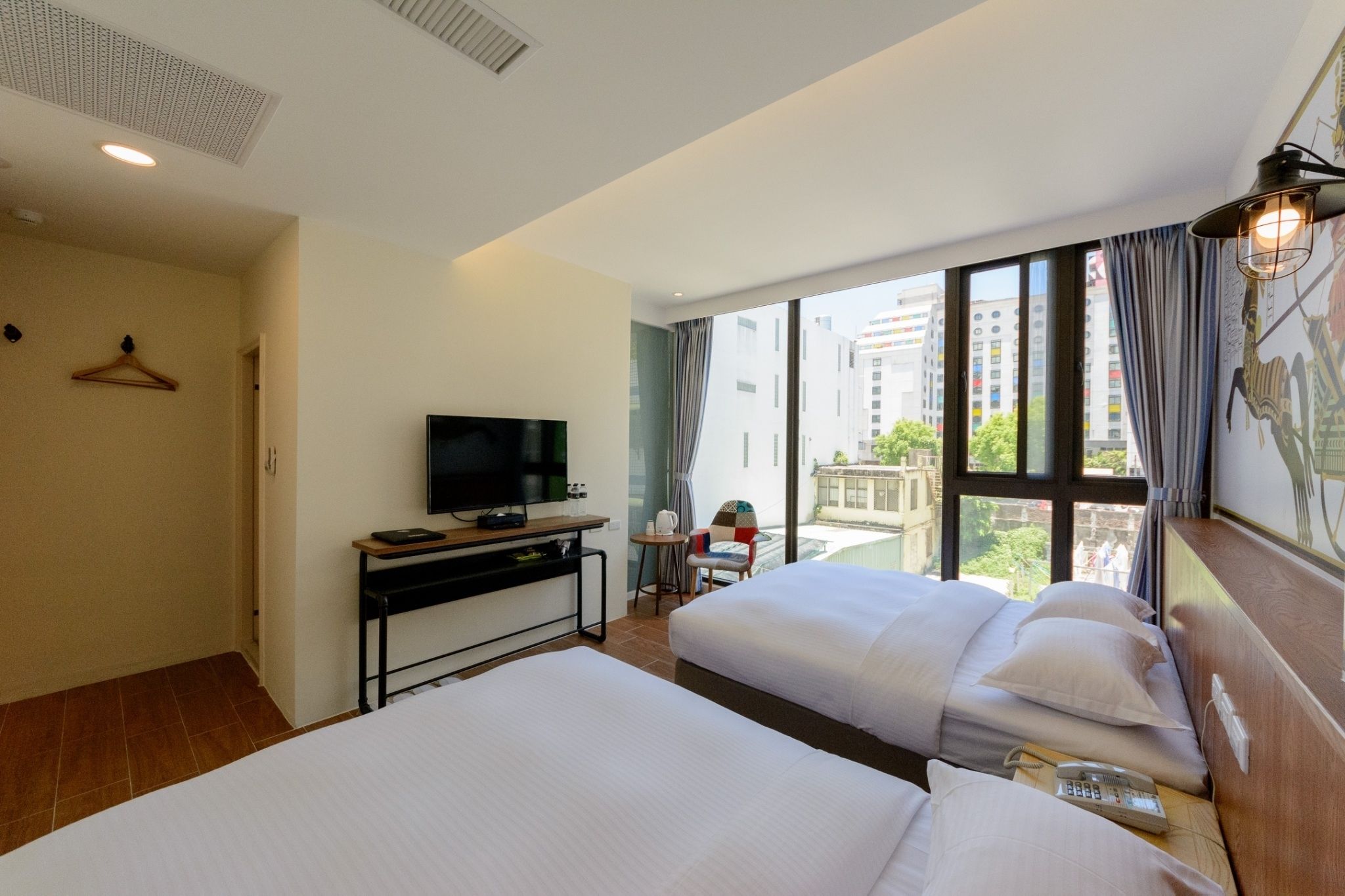 classic quadruple room | premium bedding, desk, laptop workspace, blackout curtains