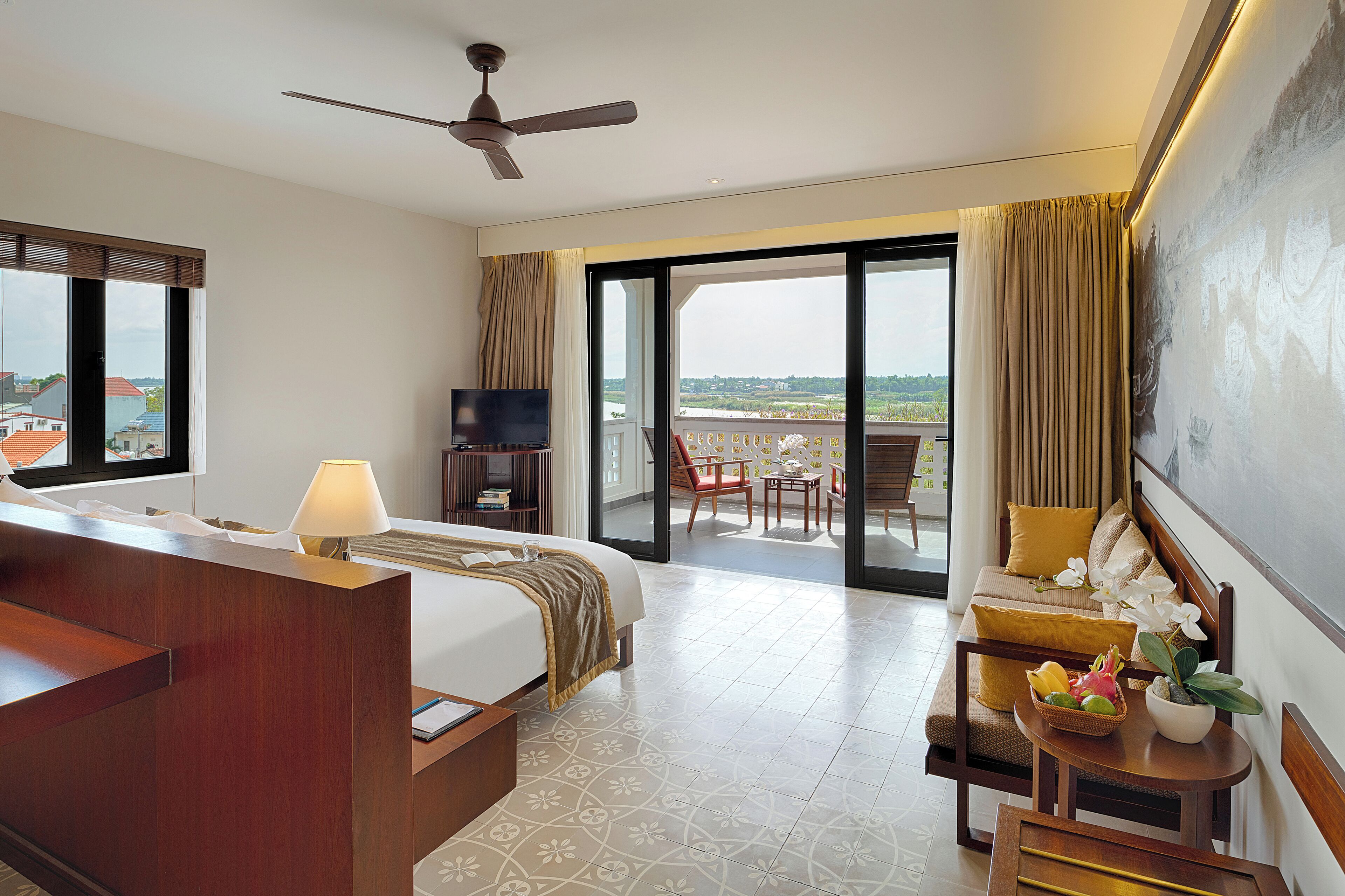 Grand Suite, River View | Minibar, in-room safe, desk, blackout drapes