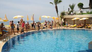 Indoor pool, outdoor pool, pool umbrellas, sun loungers