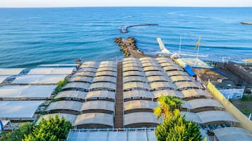 Private beach, sun loungers, beach bar