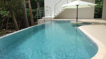 Indoor pool, outdoor pool, pool umbrellas, sun loungers