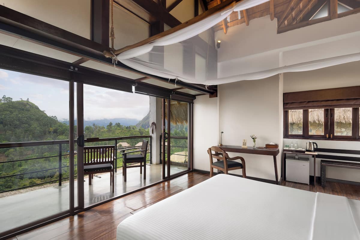 Habitación Deluxe doble, 1 cama doble, vistas a la montaña | Ropa de cama de alta calidad, minibar, caja fuerte y escritorio