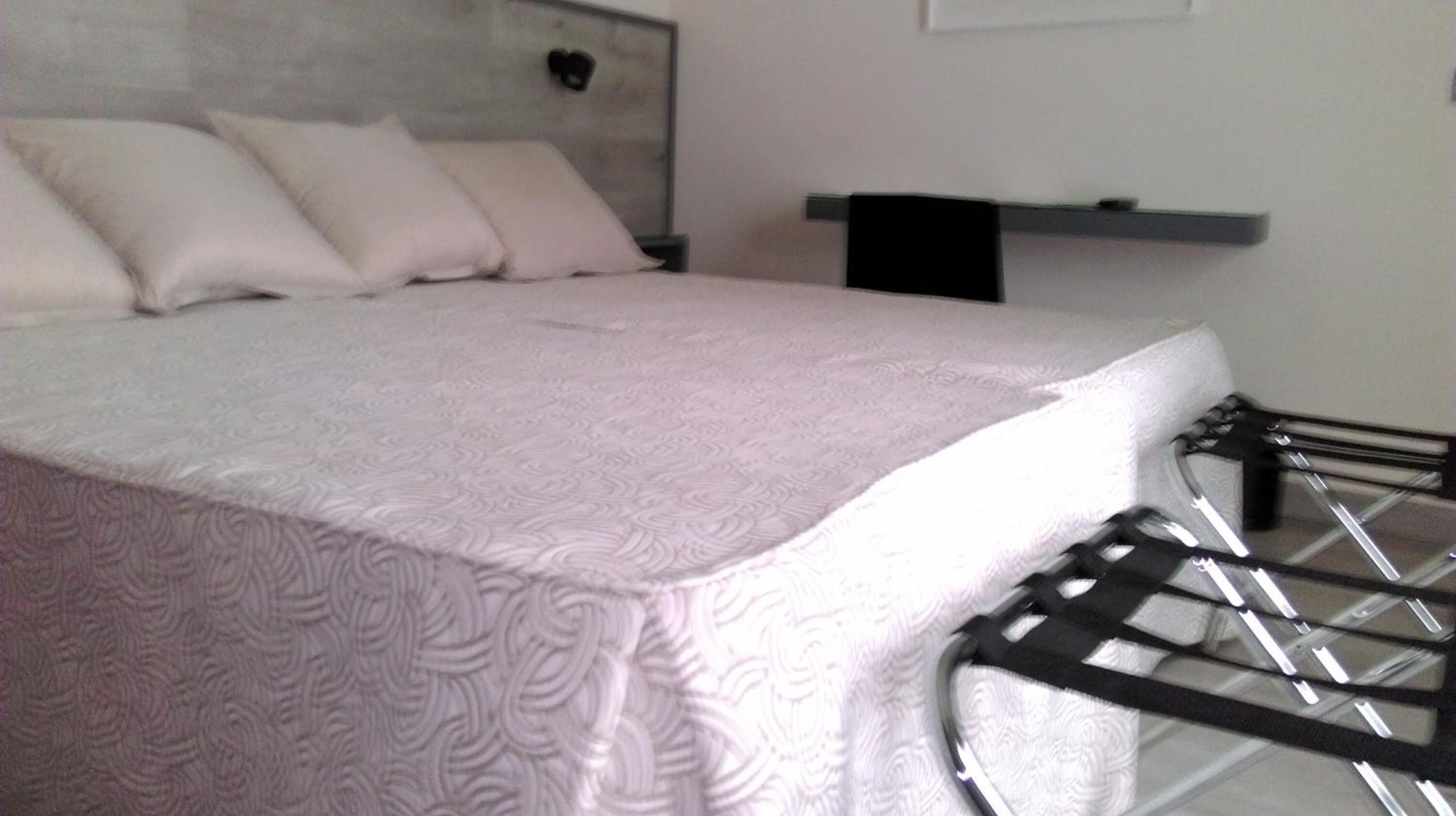 desk, blackout curtains, free wifi, bed sheets