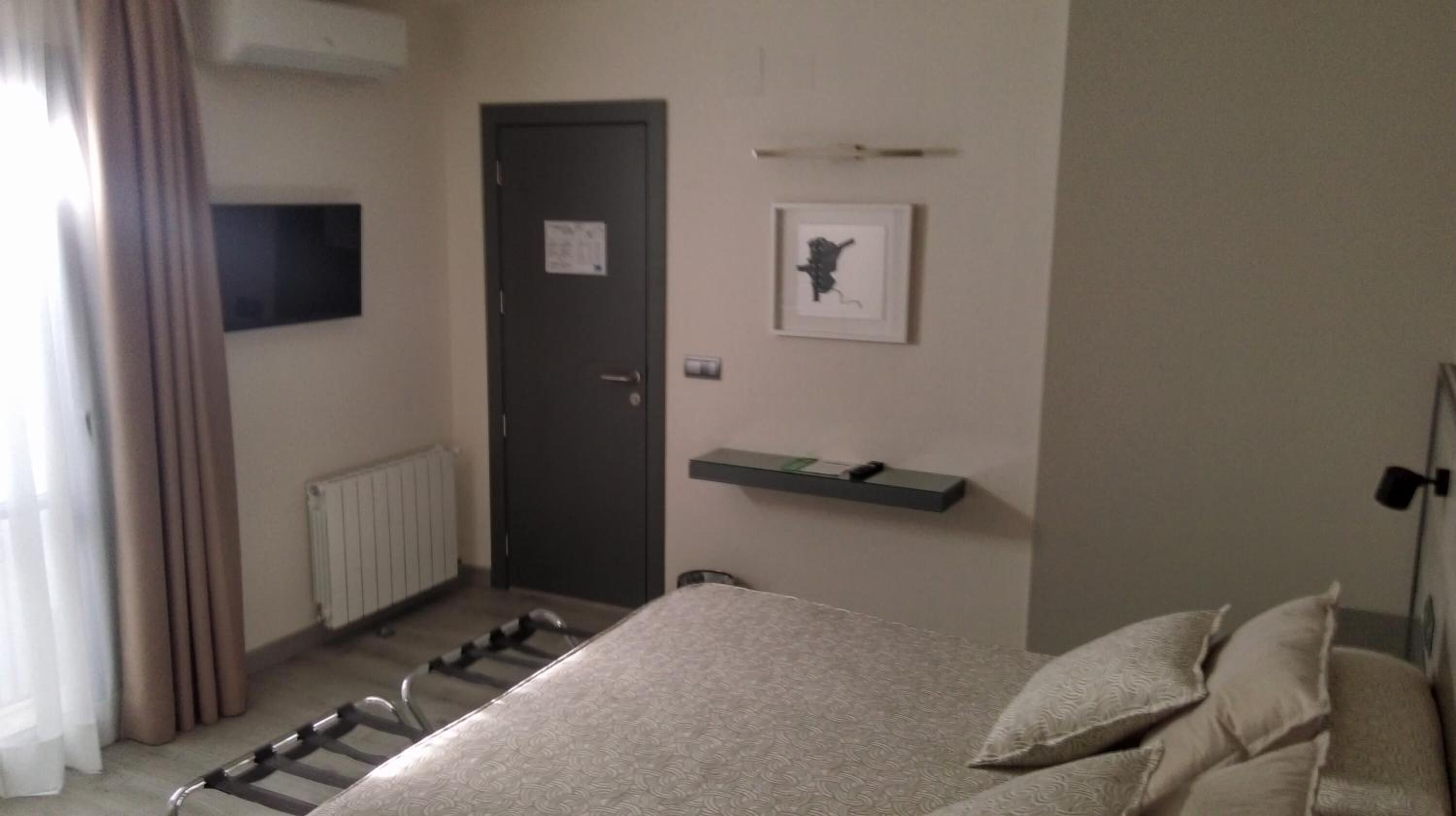 desk, blackout curtains, free wifi, bed sheets