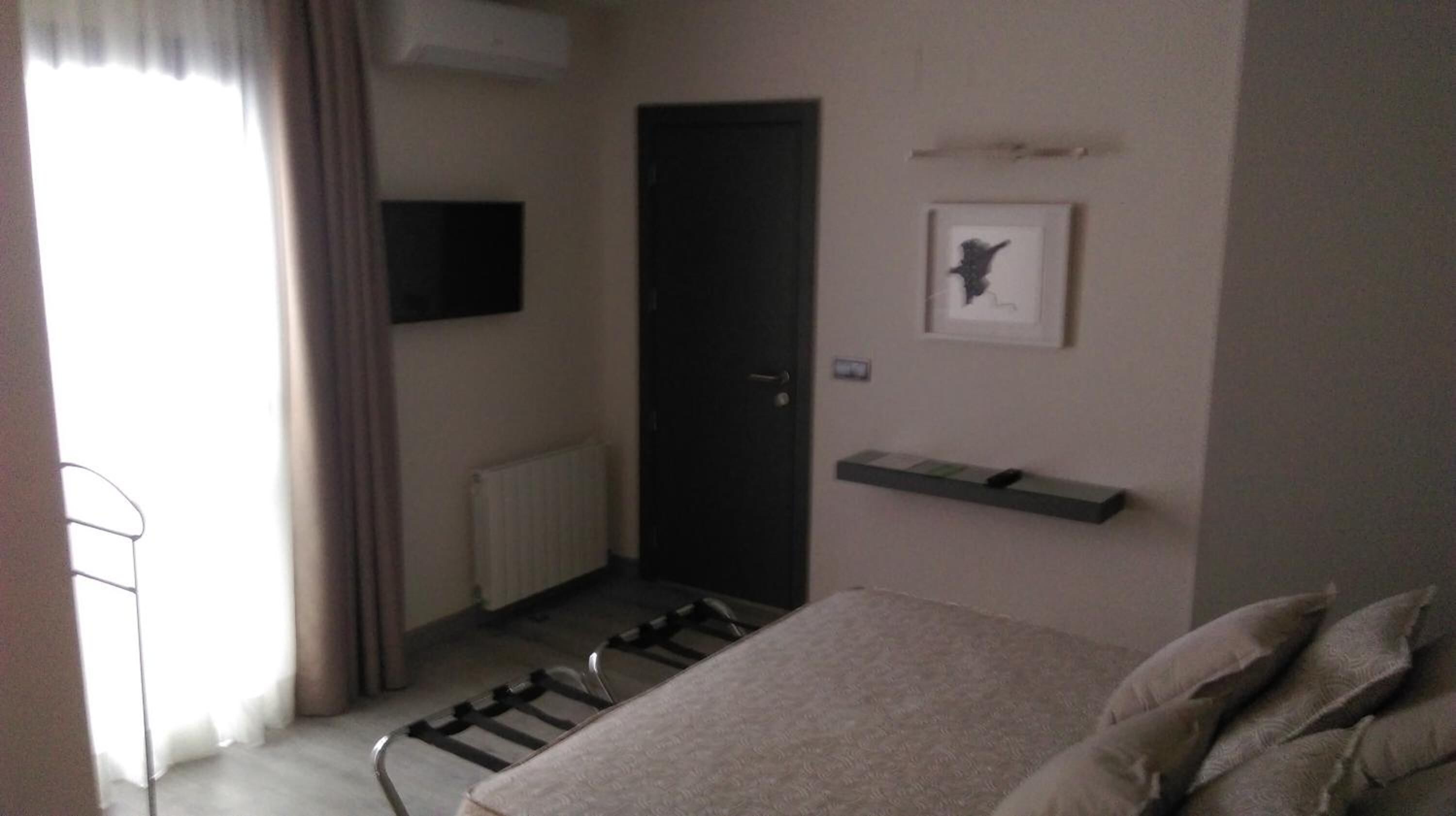 desk, blackout curtains, free wifi, bed sheets